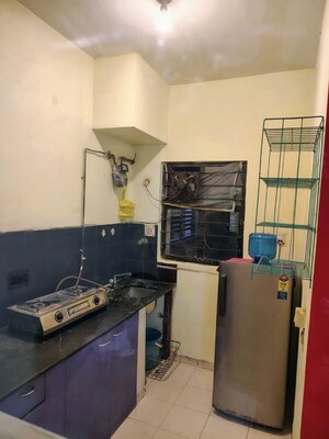Kitchen in 2 BHK Apartment at Ambuja Upohar The Condoville, Em Bypass – for Rent