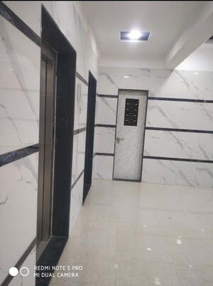 Building Lobby in 1 BHK Apartment at Global Prestige, Vasai East – for Sale