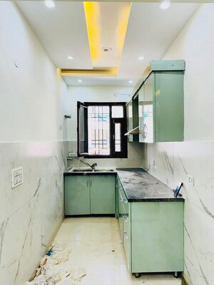 Kitchen in 2.5 BHK Builder Floor at Guru Nanak Enclave, Dhakoli – for Sale