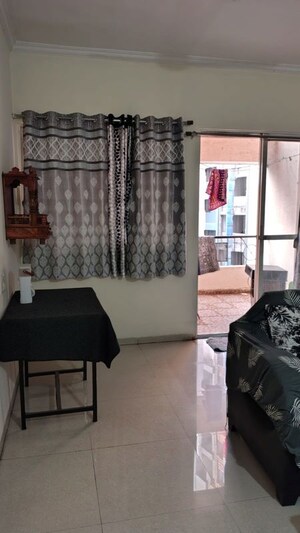 Living Room in 2 BHK Apartment at Aastha CHS Wakad, Wakad – for Rent
