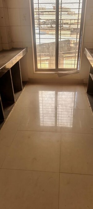 Kitchen in 2 BHK Apartment at Jai Tirupati CHS, Vasai East – for Sale