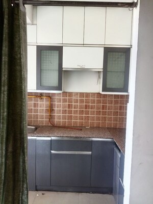 Kitchen in 2.5 BHK Apartment at Mahagun My Woods, Sector 16c Greater Noida – for Rent