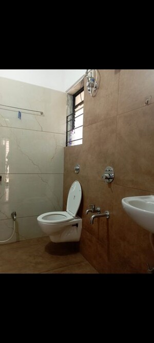 Bathroom in 1 BHK Apartment at Raunak Unnathi Woods Phase 7 A And B, Ghodbunder Road – for Rent
