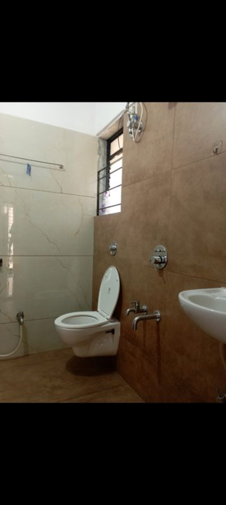 Bathroom, raunak-unnathi-woods-phase-7-a-and-b 1 Bedroom 410 Sq.Ft. Apartment In Ghodbunder Road Thane 10358856