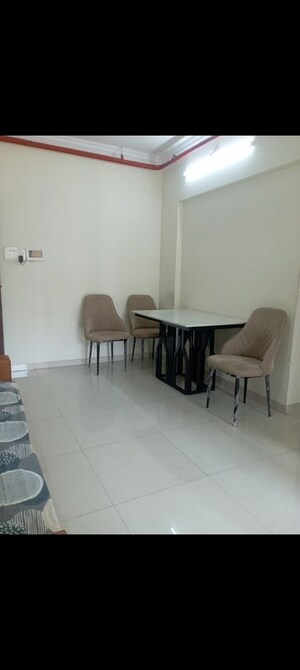 Living Room in 1 BHK Apartment at Raunak Unnathi Woods Phase 7 A And B, Ghodbunder Road – for Rent