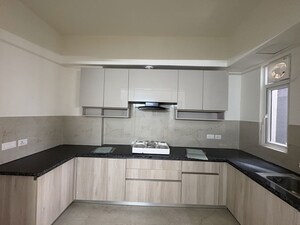Kitchen in 3.5 BHK Apartment at Smart World Orchard, Sector 61 – for Rent