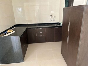 Kitchen in 2 BHK Apartment at Karan Sara, Baner – for Rent