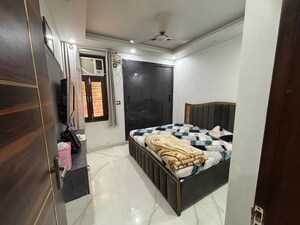 Bedroom in 3 BHK Builder Floor at Rajouri Garden – for Rent