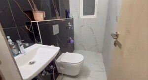 Team Area in 2 BHK Apartment at Ruparel Sky Green, Kandivali West – for Rent