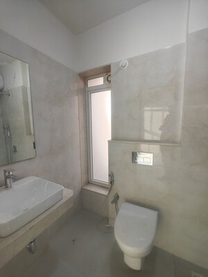 Bathroom in 4 BHK Apartment at Seawoods – for Rent