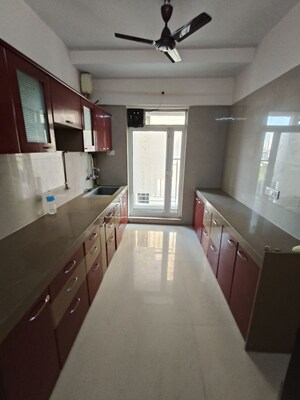 Kitchen in 2 BHK Apartment at Dosti Group Imperia, Manpada – for Rent
