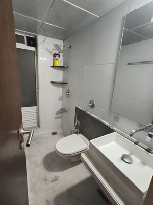 Bathroom in 2 BHK Apartment at Dosti Group Imperia, Manpada – for Rent