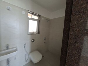 Bathroom in 1 BHK Apartment at Raunak 108, Kasarvadavali – for Rent