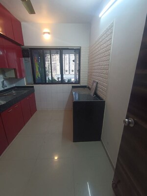 Kitchen in 2 BHK Apartment at Landmark CHS Malad, Malad West – for Rent