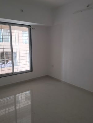 Room in 2 BHK Apartment at Urban Skyline Phase 1, Ravet – for Rent