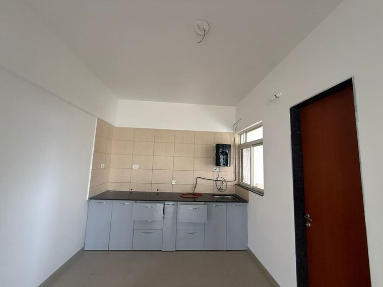 Kitchen, kolte-patil-life-republic-aros 3 Bedroom 1130 Sq.Ft. Apartment In Hinjewadi Pune 10359302