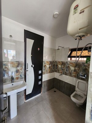 Washroom in 3 BHK Builder Floor at Mohit Nagar – for Rent