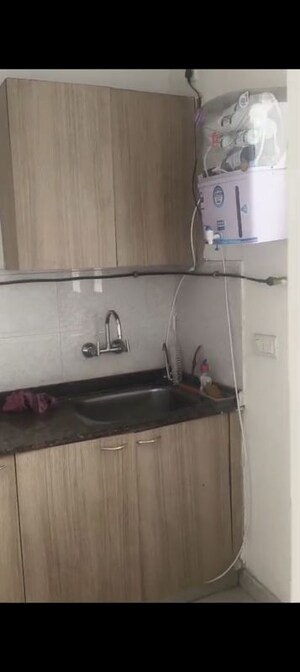 Kitchen in 2 BHK Apartment at Hawelia Valencia Square, Sector 1 Greater Noida – for Rent