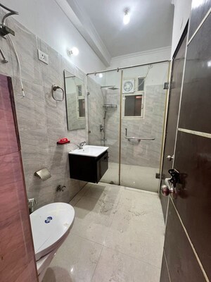 Bathroom in 4 BHK Builder Floor at Green Fields Colony – for Rent