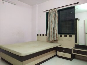 Bedroom in 2 BHK Apartment at Radhika Park, Wadgaon Sheri – for Sale