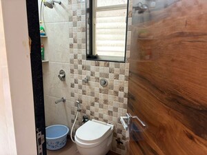 Bathroom in 2 BHK Apartment at Vertex Solitaire, Kalyan West – for Sale