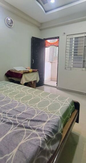 Bedroom in 2 BHK Apartment at 9Star Namami Apartment, Puppalaguda – for Rent