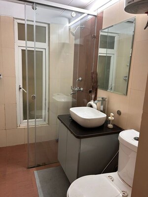 Bathroom in 2.5 BHK Apartment at Mahagun Moderne, Sector 78 – for Rent