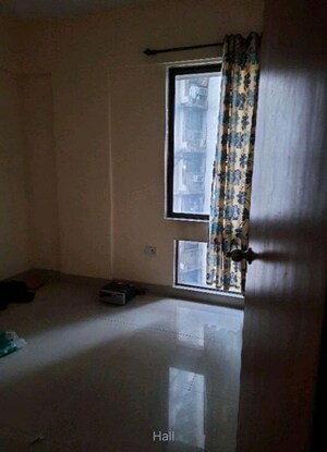 Living Room in 2 BHK Apartment at Terraform Everest Countryside Daffodil, Ghodbunder Road – for Rent