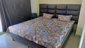 Bedroom in 2 BHK Apartment at Aditya Celebrity Homes, Sector 76 – for Rent