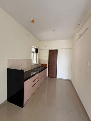 Kitchen in 2 BHK Apartment at Kolte Patil Life Republic 16th Avenue Arezo, Hinjewadi – for Rent