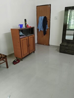 Room in 2 BHK Apartment at Manyata CHS, Tilak Nagar – for Rent