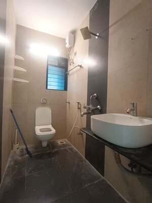 Bathroom in 2 BHK Apartment at Avkar Happy Homes CHS Ltd, Borivali West – for Rent