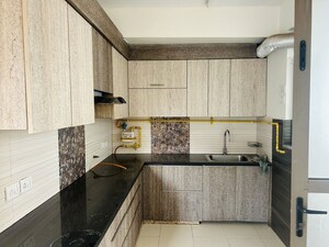 Kitchen in 2 BHK Apartment at Unitech Uniworld Gardens 2, Sector 47 – for Sale