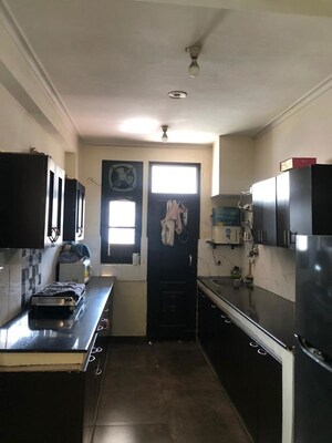 Kitchen in 3 BHK Apartment at Jaipurias Sunrise Greens Zirakpur, Vip Road – for Rent