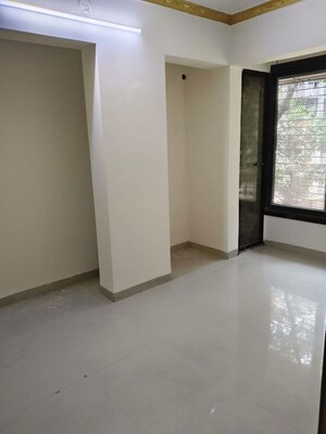 Room in 2 BHK Apartment at Manyata CHS, Tilak Nagar – for Rent
