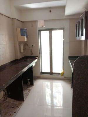 Kitchen in 1 BHK Apartment at Arch Gardens, Mira Road East – for Sale