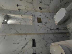 Bathroom in 3 BHK Builder Floor at BPTP Parkland Pride, Sector 77 – for Sale
