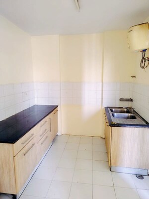 Kitchen in 4 BHK Builder Floor at BPTP Parkland Pride Phase 2, Sector 77 – for Sale