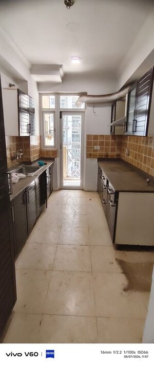 Kitchen in 3 BHK Apartment at Amrapali Eden Park, Sector 50 – for Rent