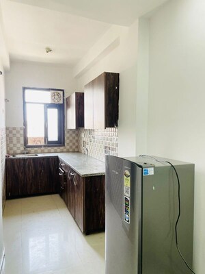 Kitchen in 2 BHK Builder Floor at Freedom Fighters Enclave – for Rent