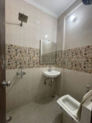 Bathroom in 2 BHK Builder Floor at Freedom Fighters Enclave – for Rent