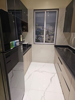 Kitchen in 1 BHK Apartment at DGS Sheetal Kiara, Goregaon West – for Sale