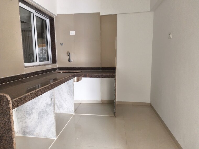 Kitchen, avant-hillway 2 Bedroom 625 Sq.Ft. Apartment In Goregaon East Mumbai 10360373
