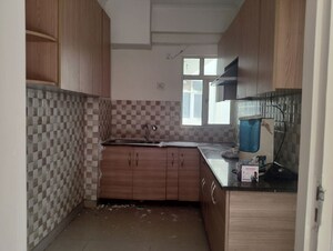 Kitchen in 2 BHK Apartment at Gaur City 4th Avenue, Sector 4 Greater Noida – for Rent