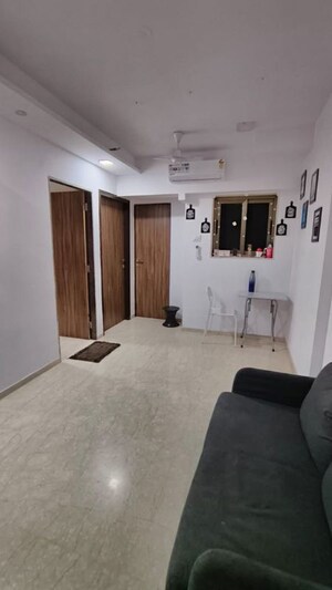 Living Room in 2 BHK Apartment at Platinum Prive, Andheri West – for Rent
