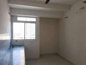 Kitchen in 1 RK Apartment at Puranik City Reserva, Ghodbunder Road – for Rent