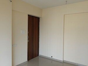 Living Room in 1 BHK Apartment at Ram Pushpanjali Residency, Owale – for Rent