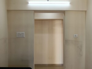 Kitchen in 2 BHK Apartment at Ram Pushpanjali Residency, Owale – for Rent