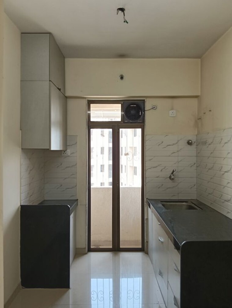 Kitchen, ram-pushpanjali-residency 2 Bedroom 680 Sq.Ft. Apartment In Owale Thane 10360559