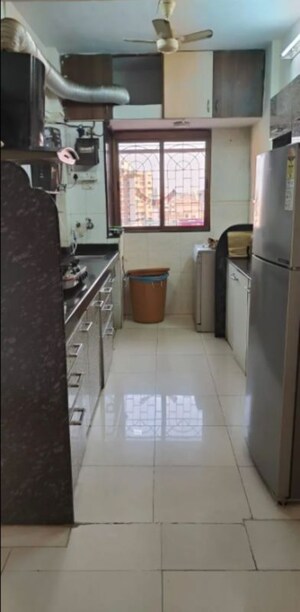 Kitchen in 2 BHK Apartment at Royal Classic Co Op Society, Andheri West – for Rent